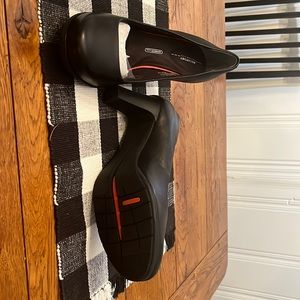 Brand new in box Rockport, Total Motion, 3-inch, black pumps. Size 9